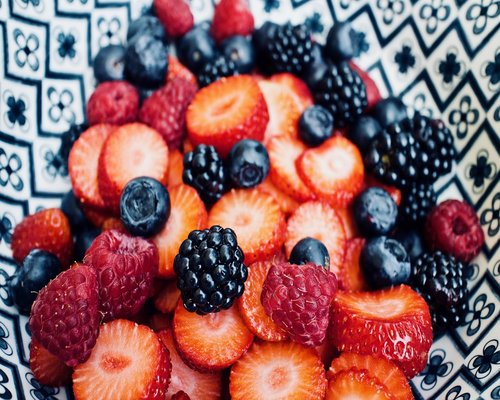 Bowl of strawberries and blueberries